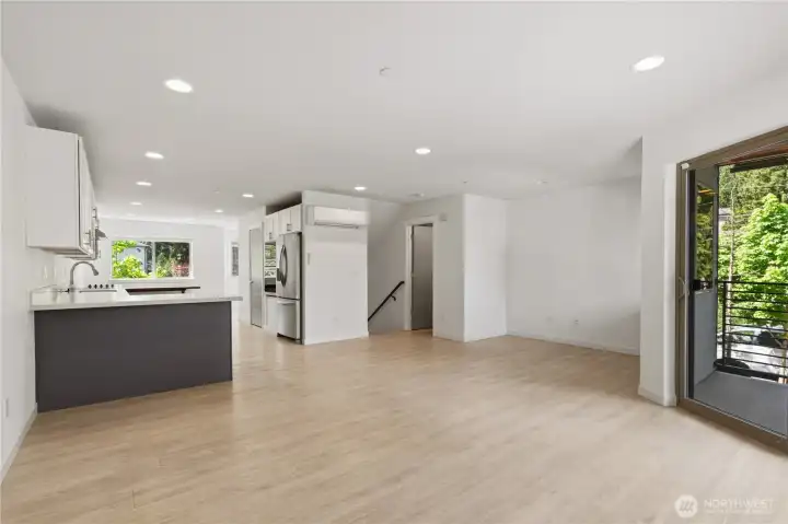 open spacious living room with patio