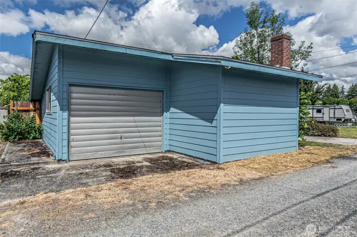 1 Car detached garage with attached finished room.
