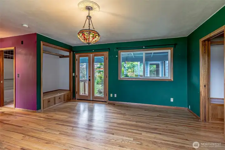 Primary Bedroom with French doors going to the back patio