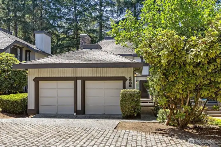 1,563 square foot home featuring a spacious two-car garage with additional overhead loft storage. 1,563 square foot home featuring a spacious two-car garage with additional overhead loft storage.