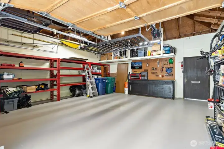 Garage also features a work bench with power. Garage also features a work bench with power.