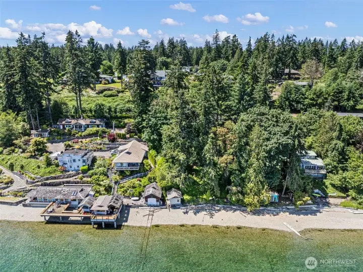 Welcome to this rare opportunity to own waterfront property in the desirable community of Olalla.