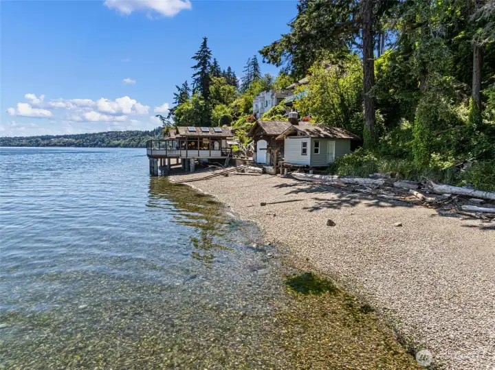 Boat shed for watercraft and beach toys.