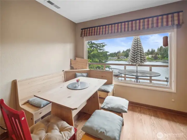 With a breakfast nook with morning views of lake.