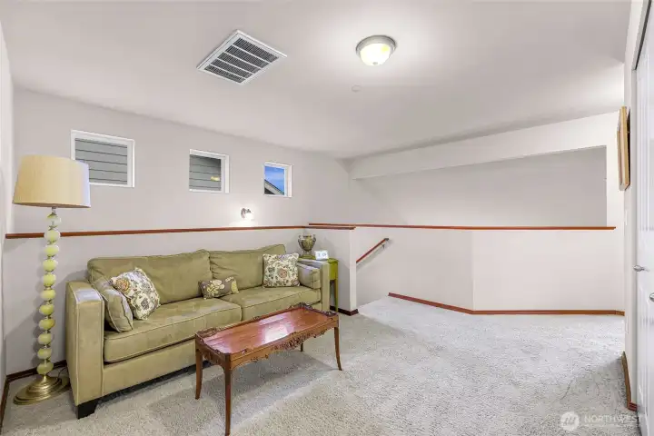 Loft area landing at the top of the stairs provides options for second living space, office, exercise space or whatever you desire! Loft area landing at the top of the stairs provides options for second living space, office, exercise space or whatever you desire!