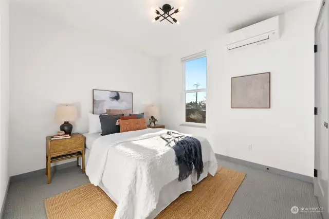 Have your guests retreat to the second-floor guest bedroom, with plenty of natural light and a layout that says, 'Stay awhile.' The perfect space for friends or your favorite four-legged guest.