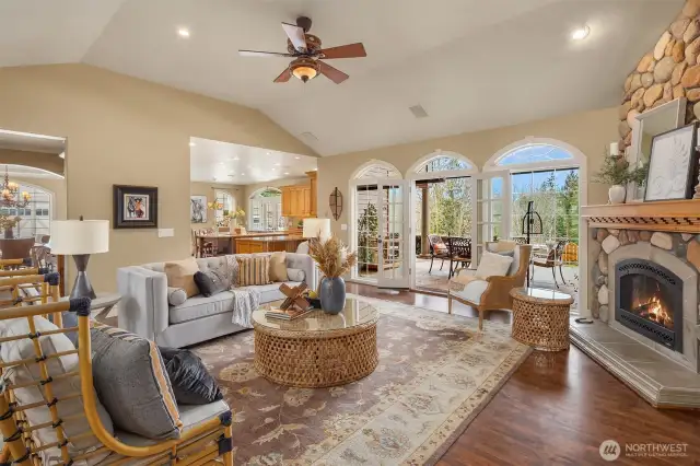 Magnificent Great Room design with French doors to covered outdoor living