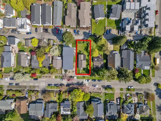 The 6000 sq ft lot runs from the street to the alley.