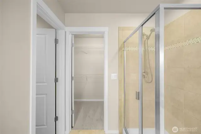 Primary bathroom and large walk in closet
