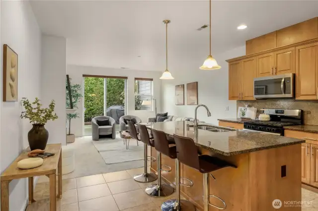 Open concept floorplan and tiled kitchen