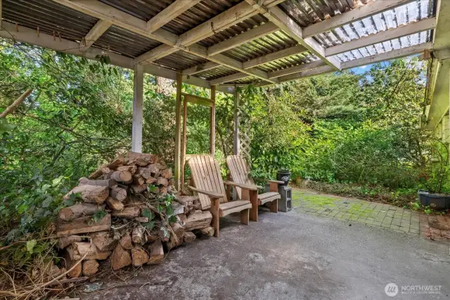 Covered patio out back to listen to the birds