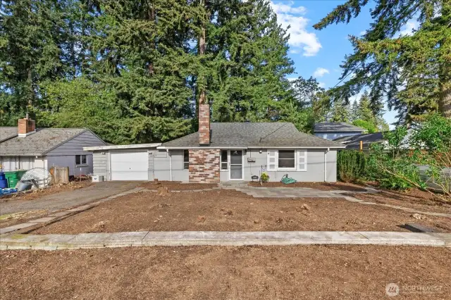 Instant equity in making this large front yard your own!