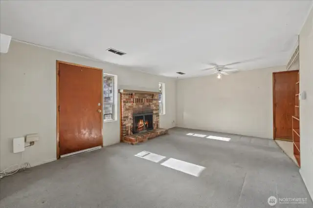 View of living space and entry to garage.