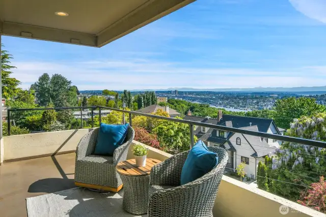 Oversized, private covered balcony with 180 views ~ North from Mt. Baker, Lake Union and the Cascades to the South and Seattle's stunning skyline !!!