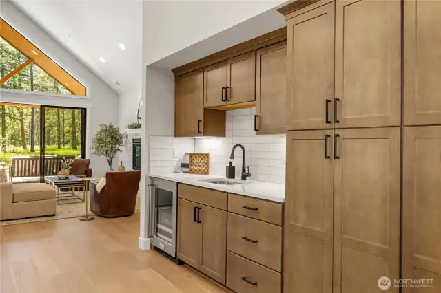 Kitchen offers an expansive wet bar great for entertaining.