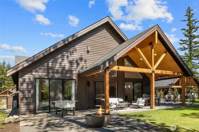 This beautiful covered back patio adds 313 additional square footage with gas firepit.