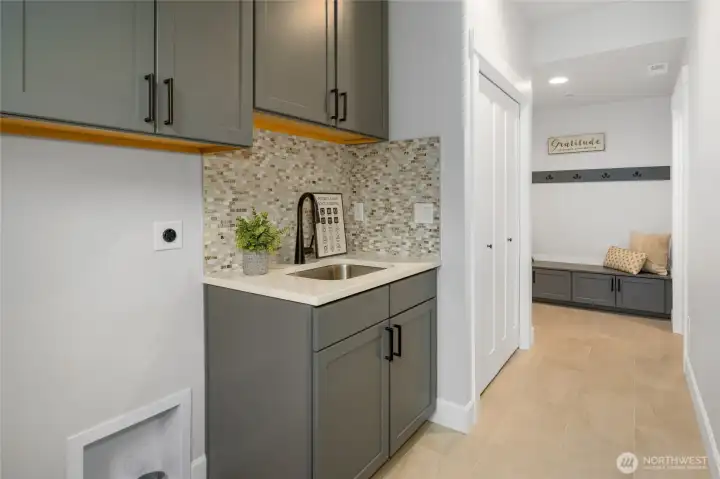 Laundry room with sink. Laundry room with sink.