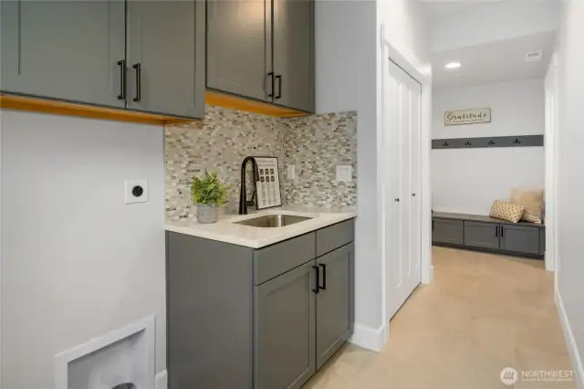 Laundry room with sink.