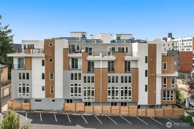 Yes, parking! The builder has paid for 5-years of leased onsite parking in the lot next door!