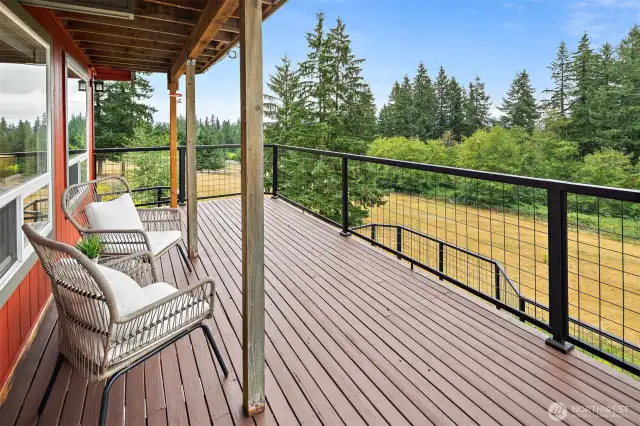 1 of 3 decks overlooking your acreage, the valley, and the Cascade Mountains.