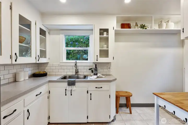 Sunny south-facing kitchen with solid wood cabinetry.