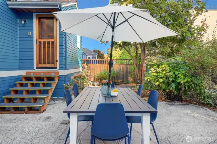 Patio located off kitchen, is perfect for summer dinners al fresco or gathering around a fire pit with friends.