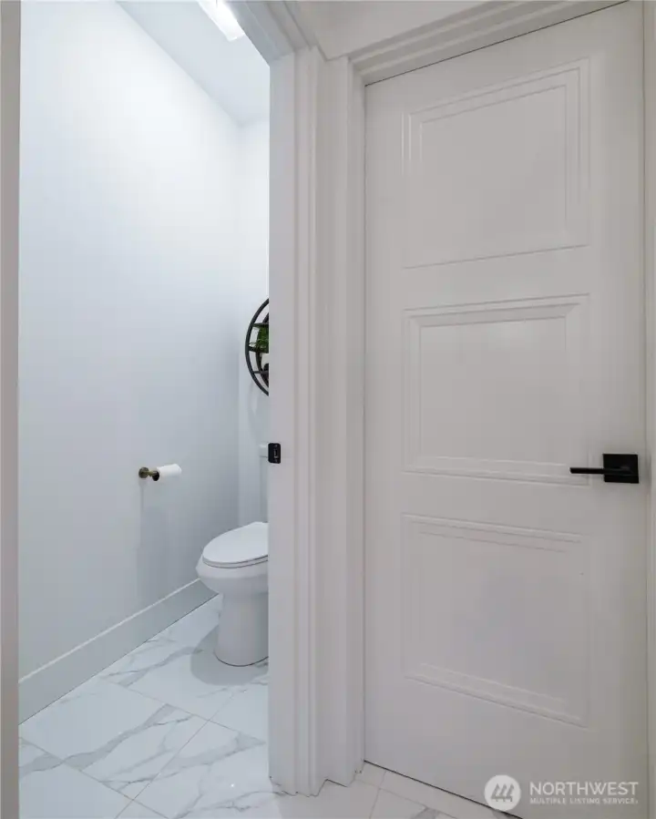 A walk-in closet and private WC complete the primary bath.