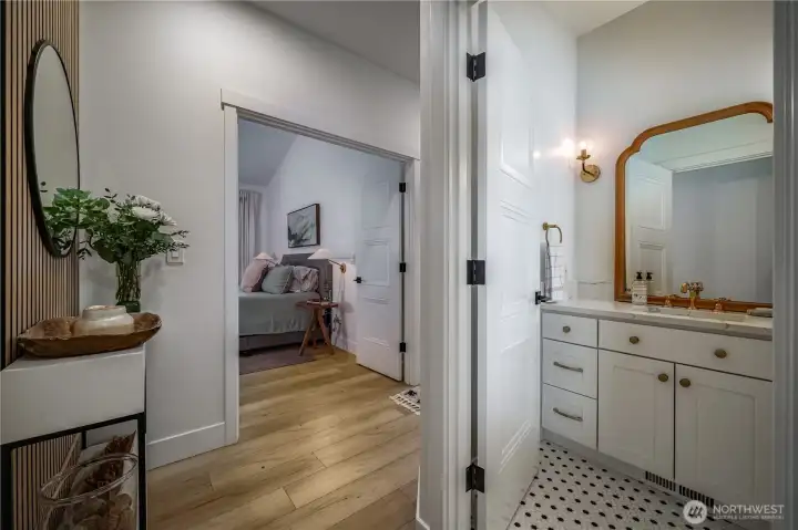 The spacious hall bath is located just across from the primary.