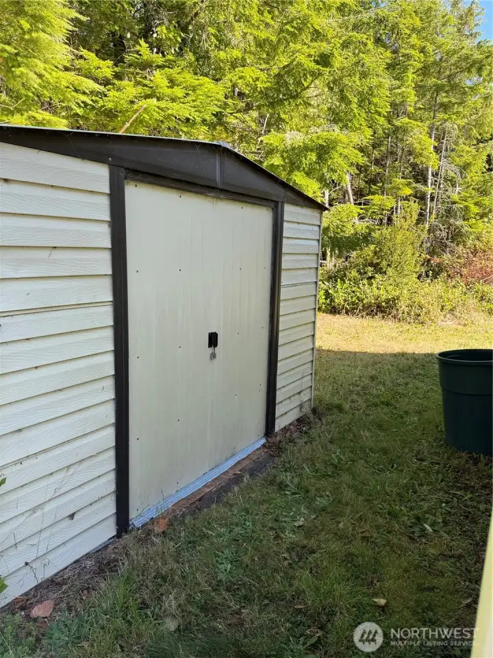 Storage shed included