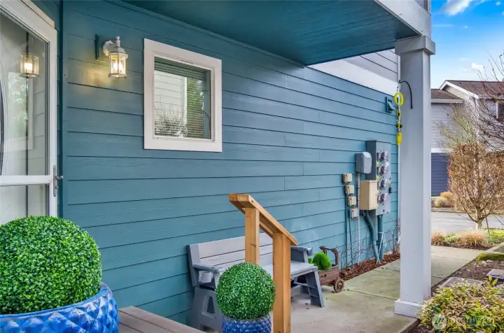Cute front porch welcomes you to this lovely home.