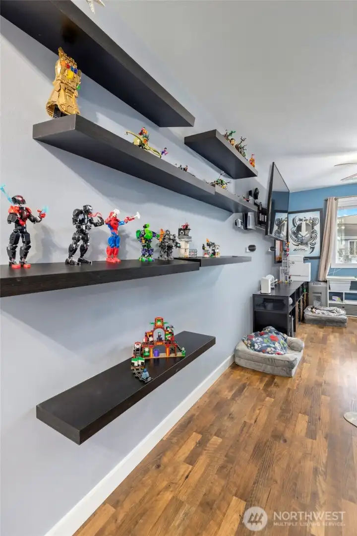 Third bedroom has a ton of space. All shelving will stay with home