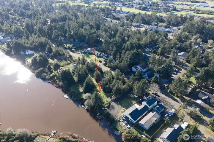 AERIAL VIEW OF THE PROPERTY AND OTHER HOMES IN THE AREA!