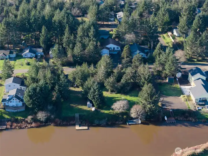 AERIAL VIEW OF THE PROPERTY SHOWING THE DOCK!