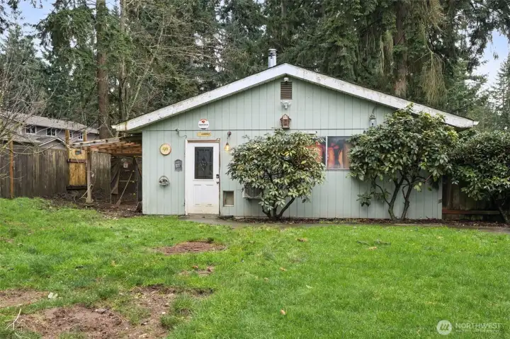 Finished 2 car garage/shop. Dog run to the left of the garage