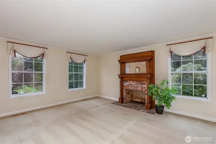 3 Fireplaces all with custom mantle