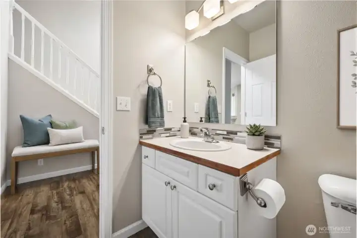 Virtually Staged Half Bath off Entry hall