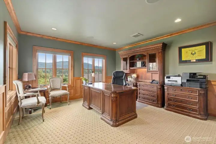 Office/den located on the main floor in its own private wing. Would make a great guest/MIL wing!