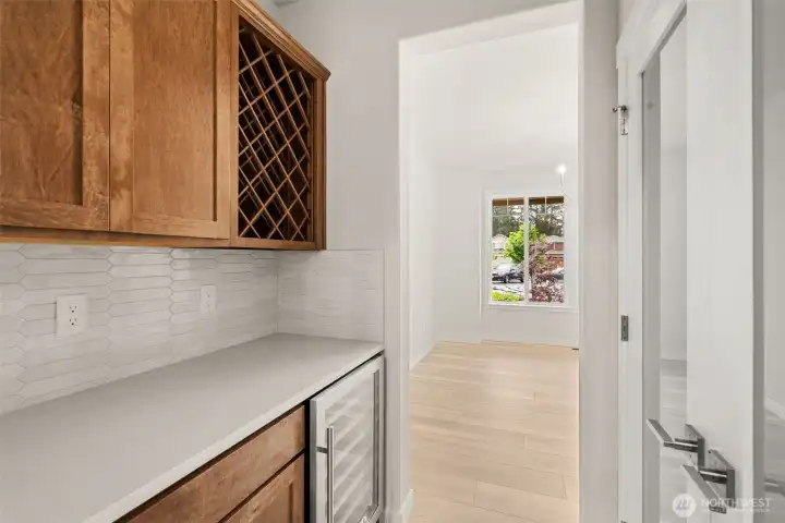 Butler's pantry with wine fridge.
