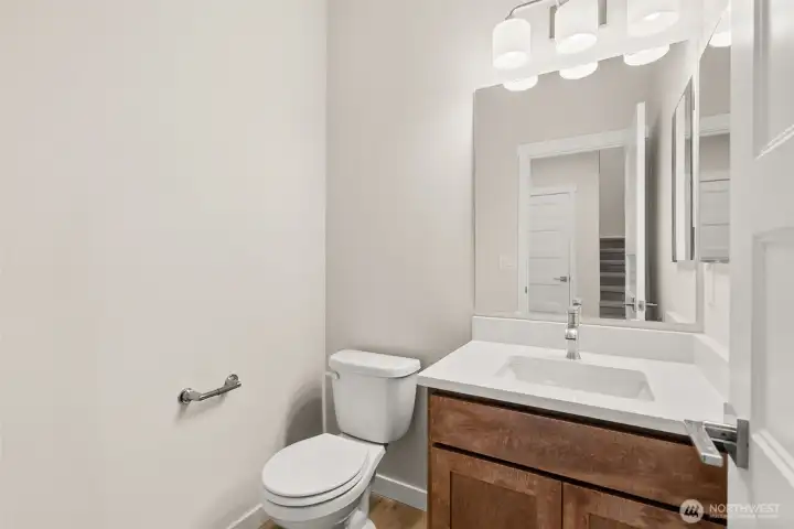 Main floor powder/ half bath for guests and convenience.