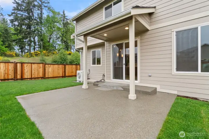 Additional outdoor living space with extended patio.