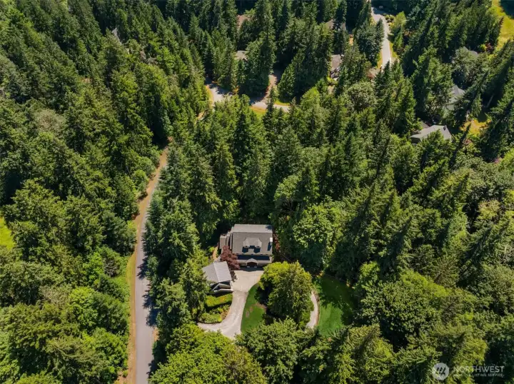 Classicly built 3,148 sf main home and a 576 sf Guest Studio over the garage are sited on 1.19 private acres that border open space on 3 sides.