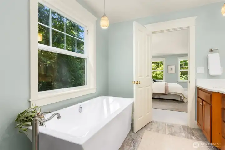 The soaking tub in the primary bathroom.