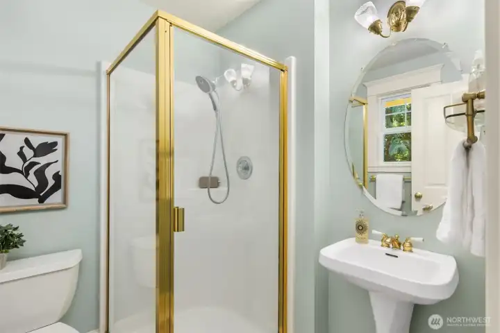 The 3/4 bathroom off of the second bedroom.