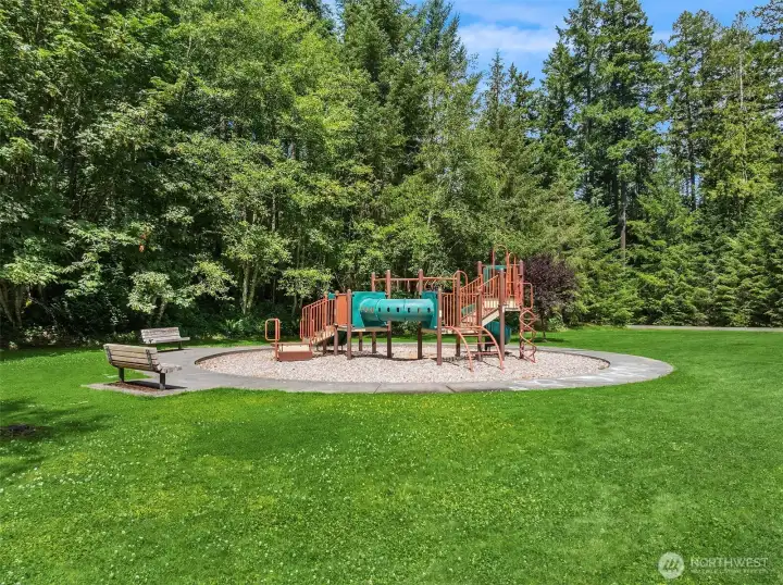 The home is adjacent to open space on three sides and is right next door to the Hidden Cove Neighborhood play park.
