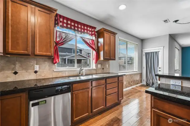 Kitchen Sink Under Window to Backyard  & Backyard Access