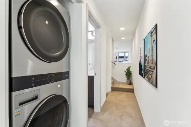 Newer full size washer/dryer on the second level.