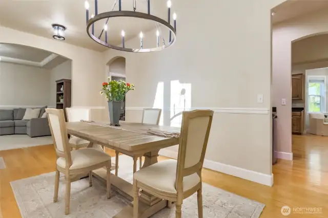 The home has a circular floor plan with the dining room accessible from the main hall or via the butlers pantry