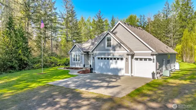 There is plenty of privacy on this lot which has unique scenery with landscape of trees surrounding your house, yard and detached garage!
