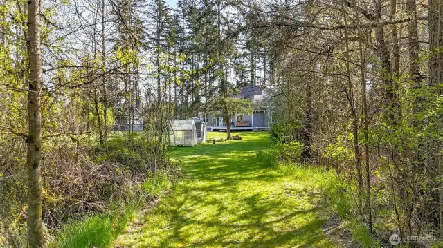 View from the north end of the property looking towards the north side of the house