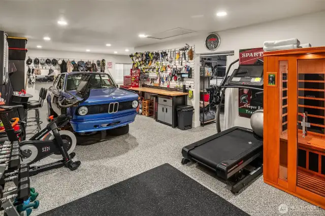 A Car-collectors/hobbyist dream: The 1,485 square foot attached garage/shop (future theater room, home office?) was expanded by the Homeowners in 2011 with parking up to 5-6 cars.